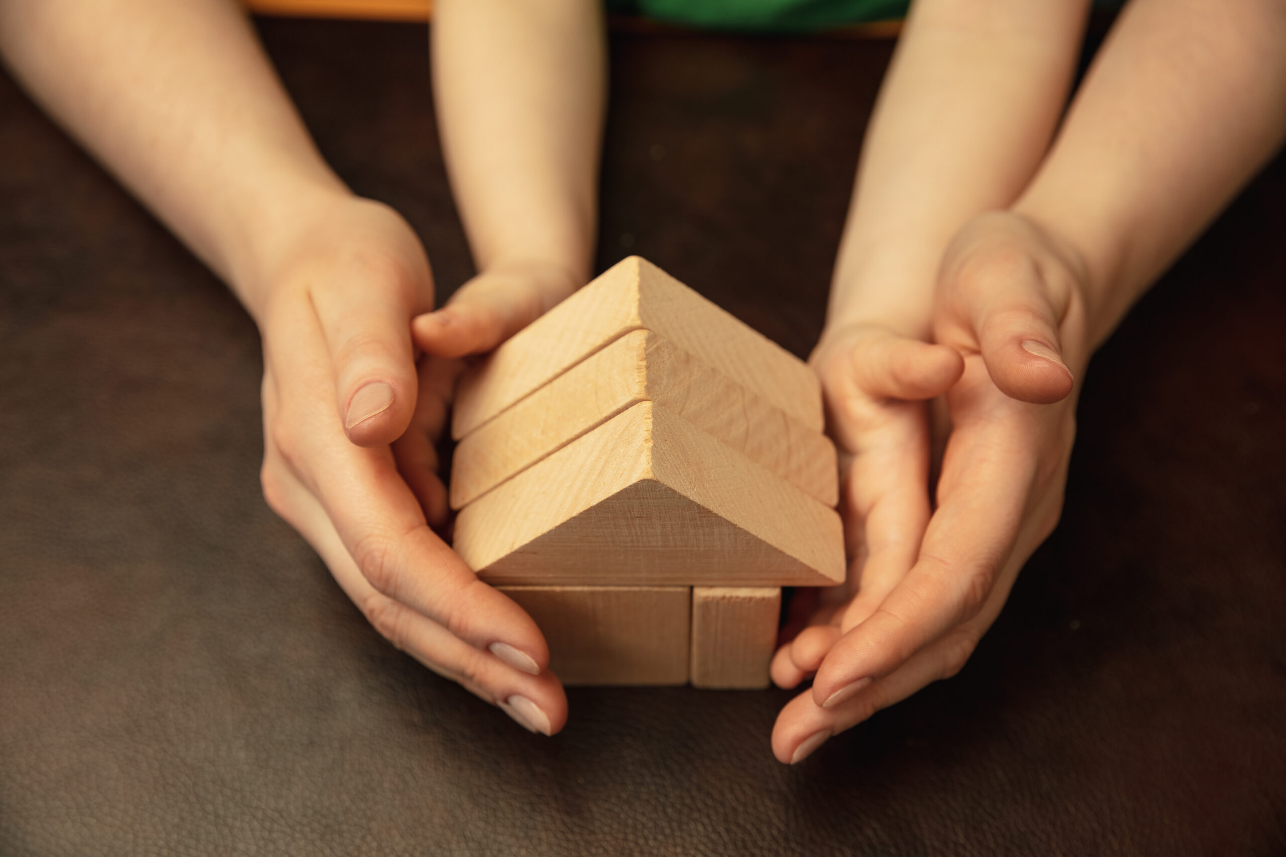 Close up of female and kid’s hands doing things together, family, home concept